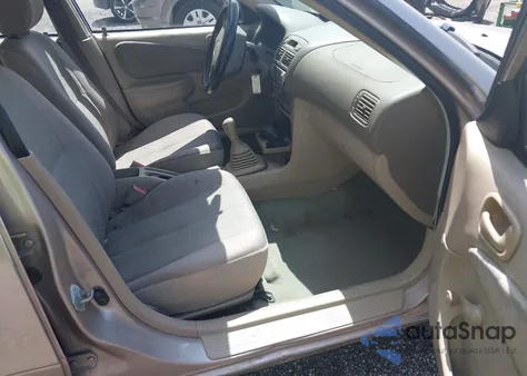 1999 Toyota Corolla Ve from USA, damaged, VIN 1NXBR12E4XZ288553